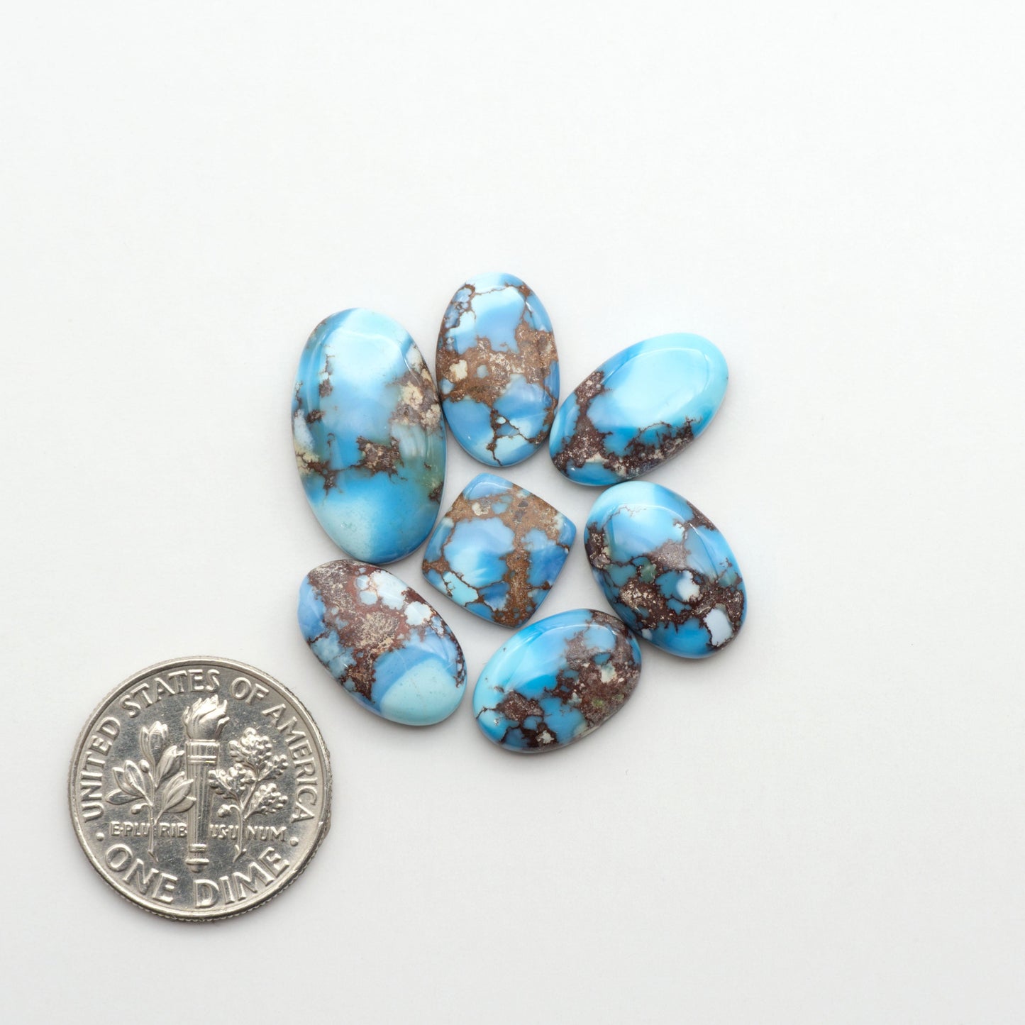 Discover the beauty of Natural Golden Hills Turquoise—prized for its icy blue tones, golden matrix, and exceptional quality. Ideal for artisan jewelry designs.