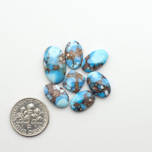 Discover the beauty of Natural Golden Hills Turquoise—prized for its icy blue tones, golden matrix, and exceptional quality. Ideal for artisan jewelry designs.