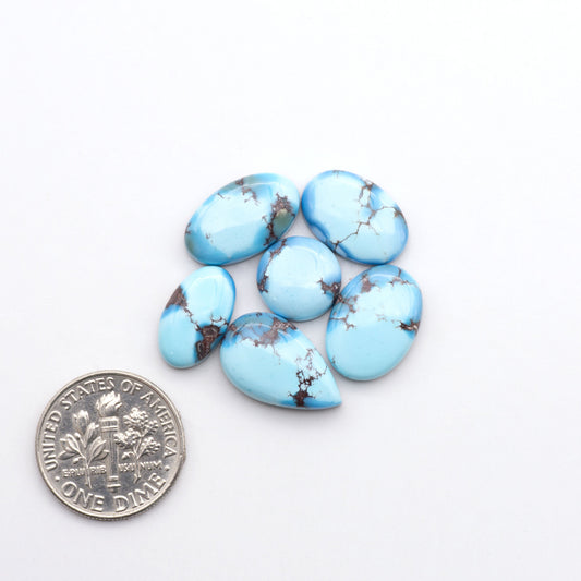 Discover the beauty of Natural Golden Hills Turquoise—prized for its icy blue tones, golden matrix, and exceptional quality. Ideal for artisan jewelry designs.