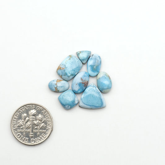 Discover the beauty of Natural Golden Hills Turquoise—prized for its icy blue tones, golden matrix, and exceptional quality. Ideal for artisan jewelry designs.