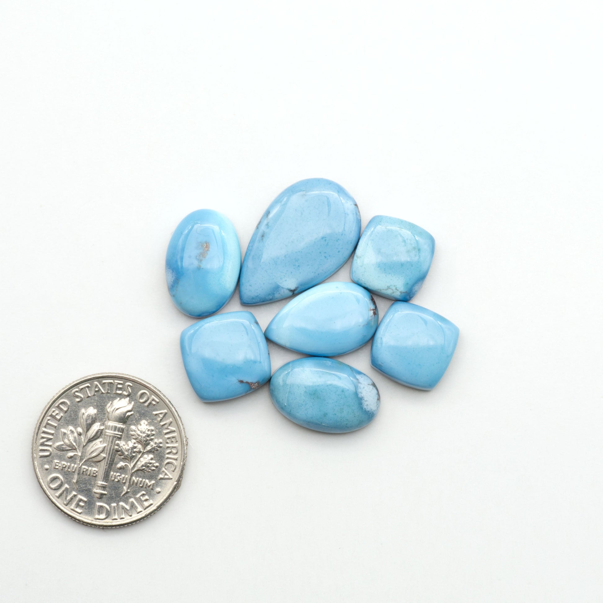 Discover the beauty of Natural Golden Hills Turquoise—prized for its icy blue tones, golden matrix, and exceptional quality. Ideal for artisan jewelry designs.