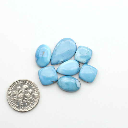Discover the beauty of Natural Golden Hills Turquoise—prized for its icy blue tones, golden matrix, and exceptional quality. Ideal for artisan jewelry designs.