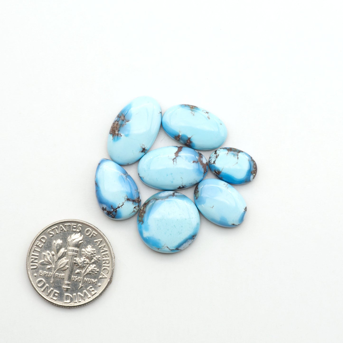 Discover the beauty of Natural Golden Hills Turquoise—prized for its icy blue tones, golden matrix, and exceptional quality. Ideal for artisan jewelry designs.