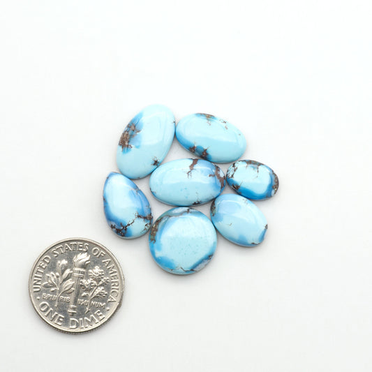 Discover the beauty of Natural Golden Hills Turquoise—prized for its icy blue tones, golden matrix, and exceptional quality. Ideal for artisan jewelry designs.