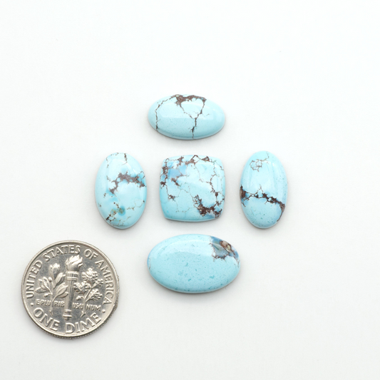 Discover the beauty of Natural Golden Hills Turquoise—prized for its icy blue tones, golden matrix, and exceptional quality. Ideal for artisan jewelry designs.