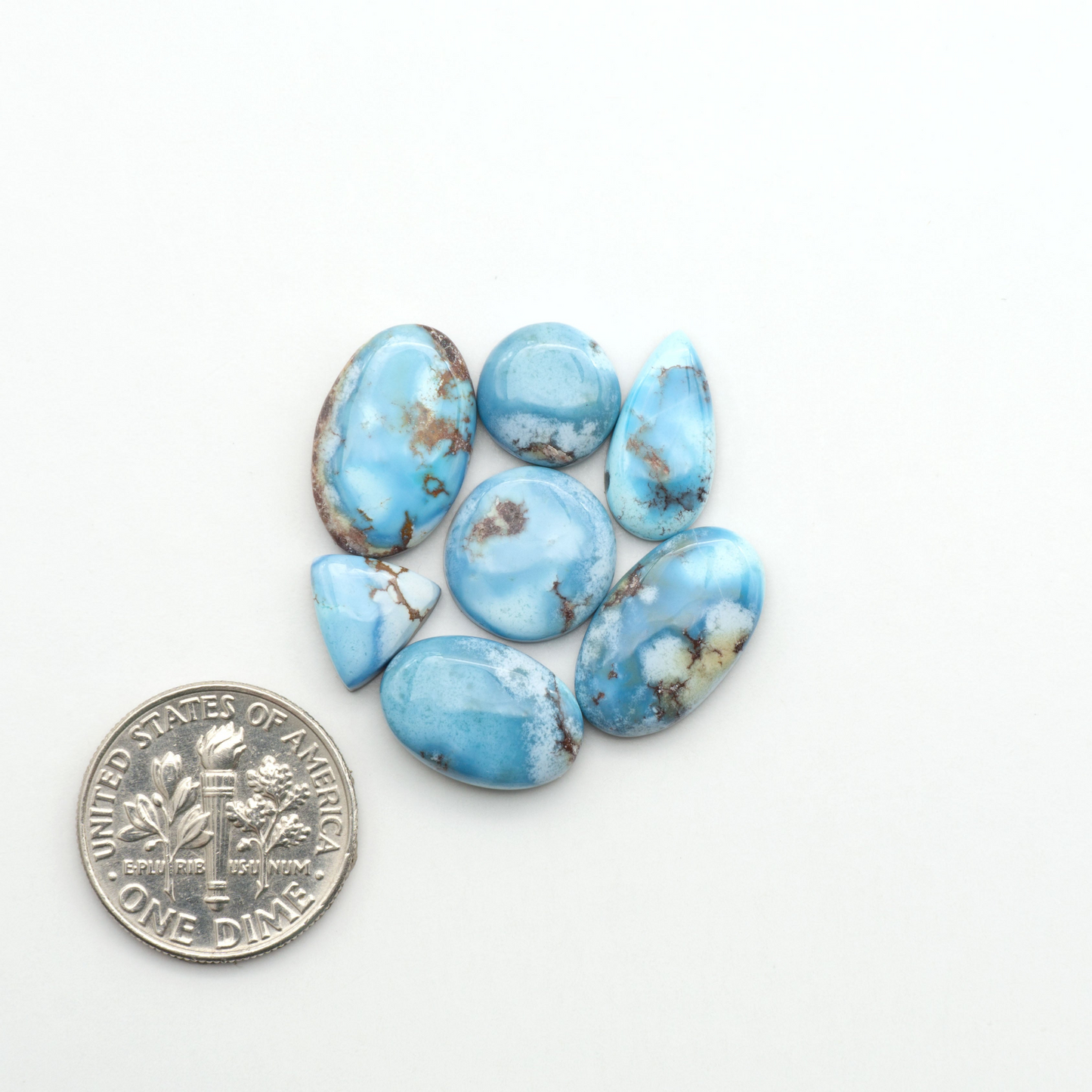 Discover the beauty of Natural Golden Hills Turquoise—prized for its icy blue tones, golden matrix, and exceptional quality. Ideal for artisan jewelry designs.