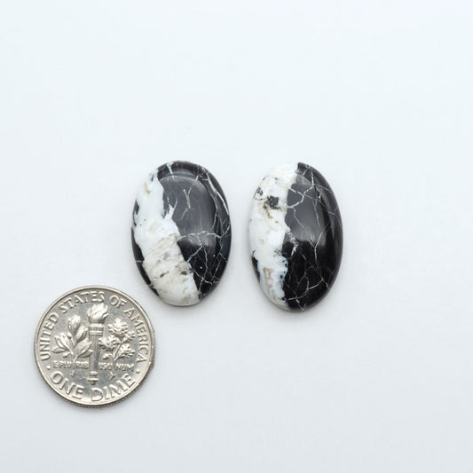 Natural White Buffalo Stone Cabochons are semi-precious gemstones cut into shapes ideal for jewelry-making, making them an excellent choice for artisans.