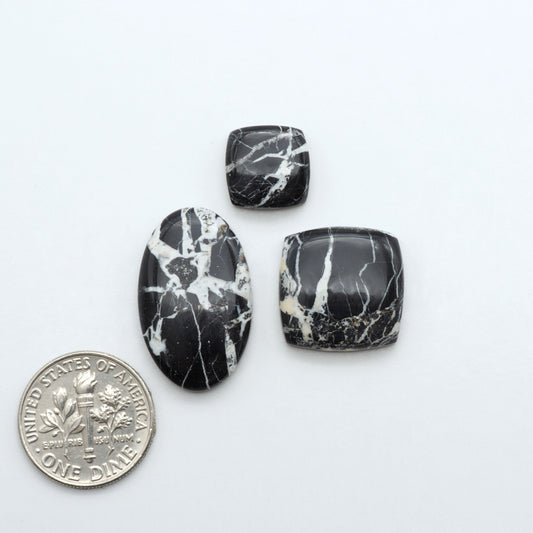 Natural White Buffalo Stone Cabochons are semi-precious gemstones cut into shapes ideal for jewelry-making, making them an excellent choice for artisans.