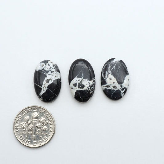 Natural White Buffalo Stone Cabochons are semi-precious gemstones cut into shapes ideal for jewelry-making, making them an excellent choice for artisans.