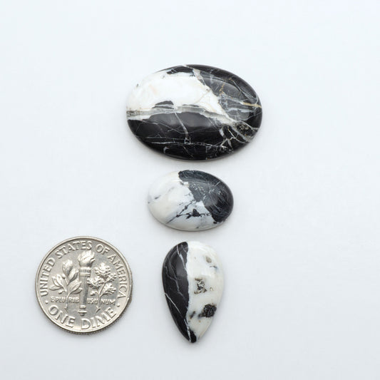 Natural White Buffalo Stone Cabochons are semi-precious gemstones cut into shapes ideal for jewelry-making, making them an excellent choice for artisans.