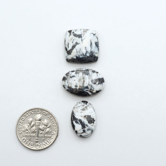 Natural White Buffalo Stone Cabochons are semi-precious gemstones cut into shapes ideal for jewelry-making, making them an excellent choice for artisans.