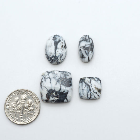 Natural White Buffalo Stone Cabochons are semi-precious gemstones cut into shapes ideal for jewelry-making, making them an excellent choice for artisans.
