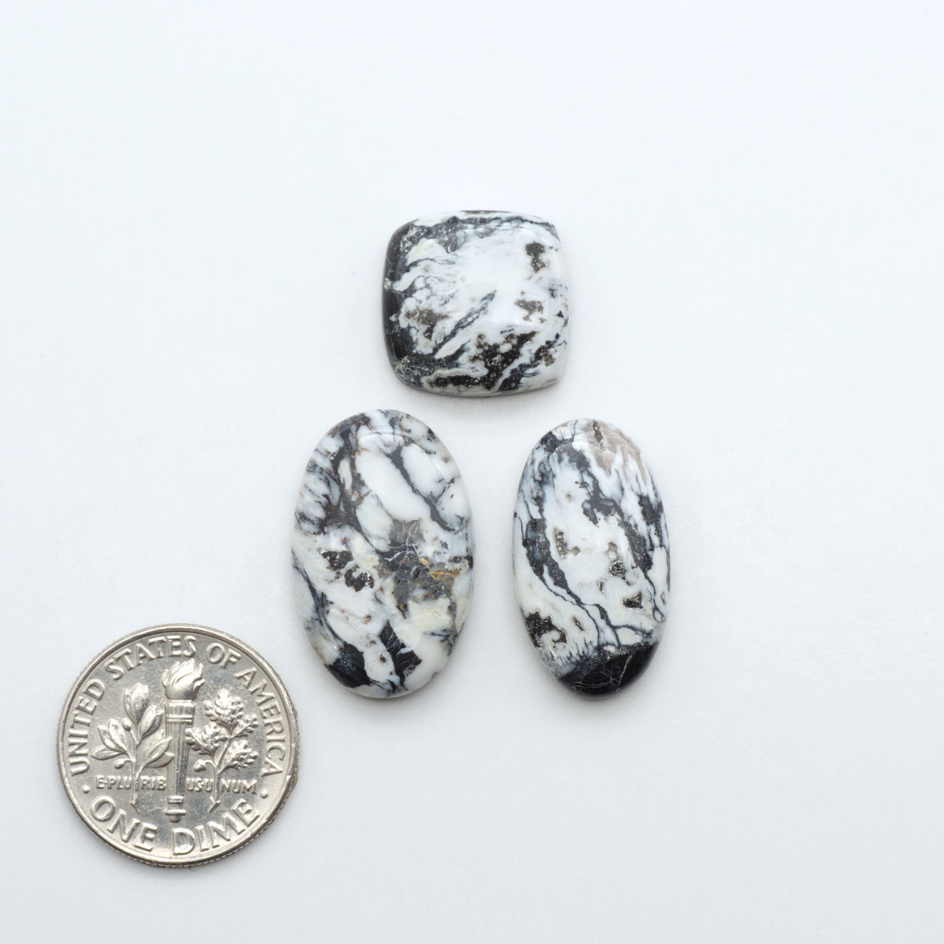 Natural White Buffalo Stone Cabochons are semi-precious gemstones cut into shapes ideal for jewelry-making, making them an excellent choice for artisans.