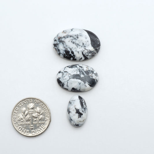 Natural White Buffalo Stone Cabochons are semi-precious gemstones cut into shapes ideal for jewelry-making, making them an excellent choice for artisans.