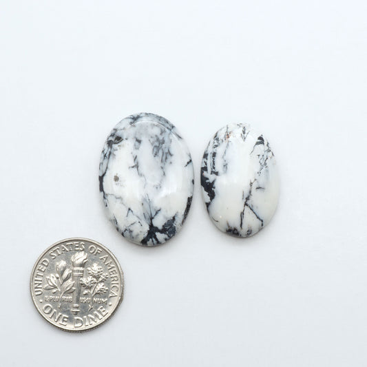 Natural White Buffalo Stone Cabochons are semi-precious gemstones cut into shapes ideal for jewelry-making, making them an excellent choice for artisans.