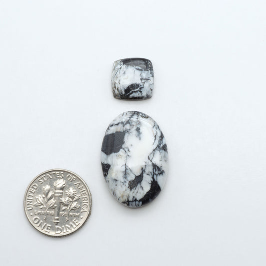 Natural White Buffalo Stone Cabochons are semi-precious gemstones cut into shapes ideal for jewelry-making, making them an excellent choice for artisans.