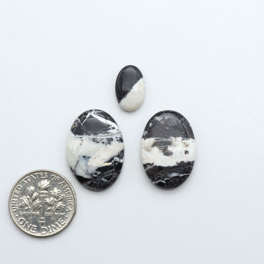 Natural White Buffalo Stone Cabochons are semi-precious gemstones cut into shapes ideal for jewelry-making, making them an excellent choice for artisans.
