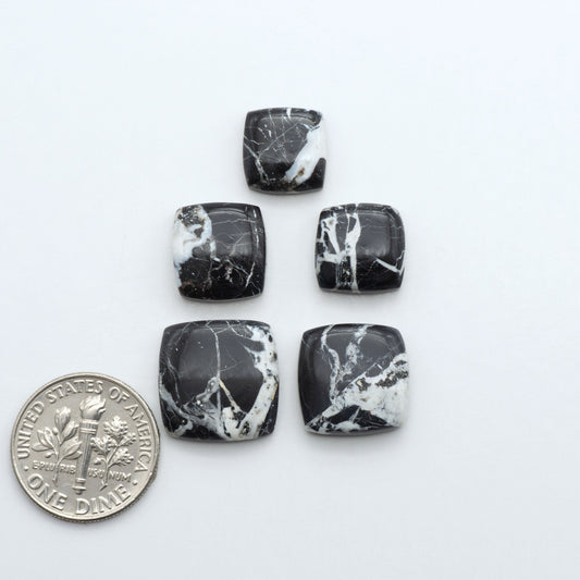 Natural White Buffalo Stone Cabochons are semi-precious gemstones cut into shapes ideal for jewelry-making, making them an excellent choice for artisans.