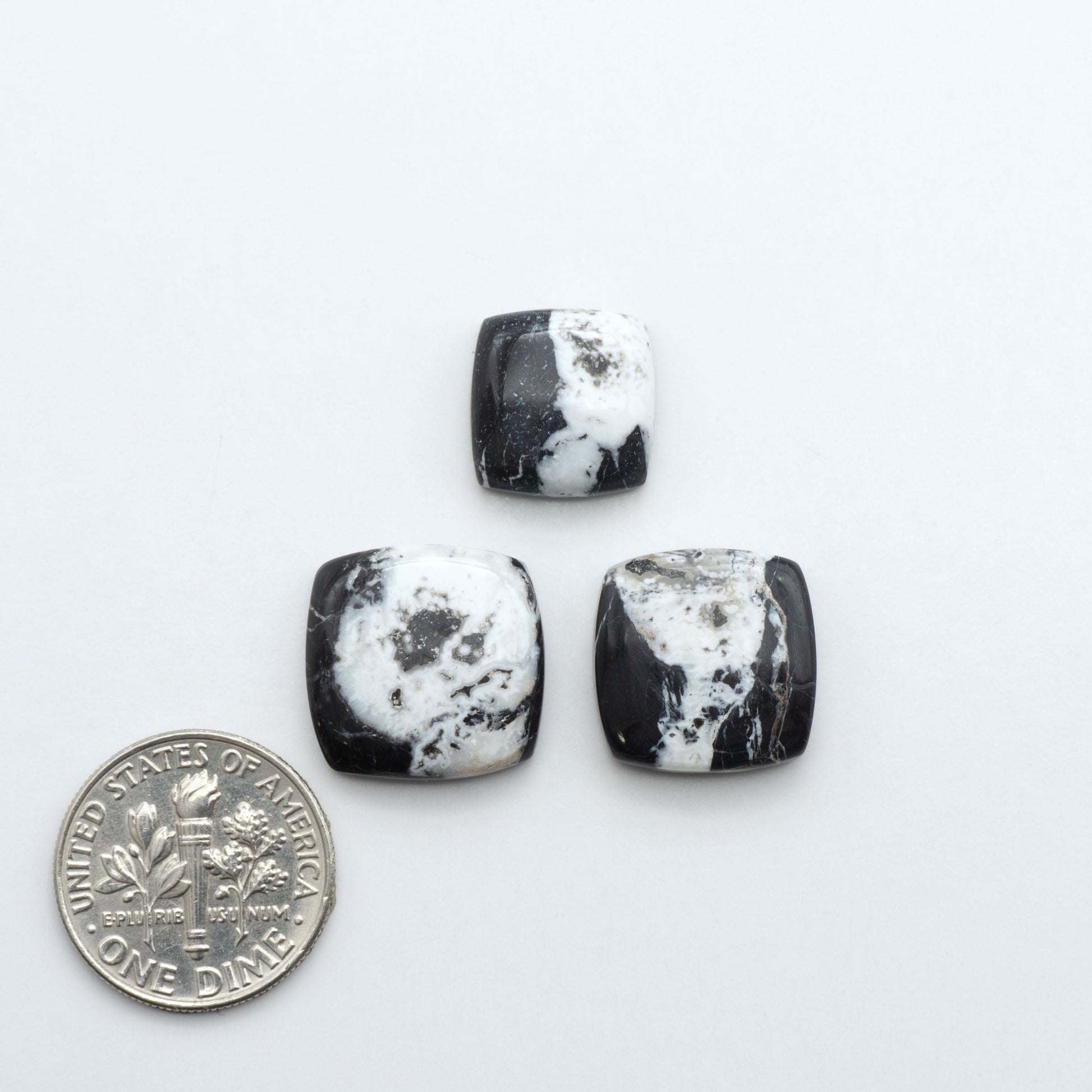 Natural White Buffalo Stone Cabochons are semi-precious gemstones cut into shapes ideal for jewelry-making, making them an excellent choice for artisans.