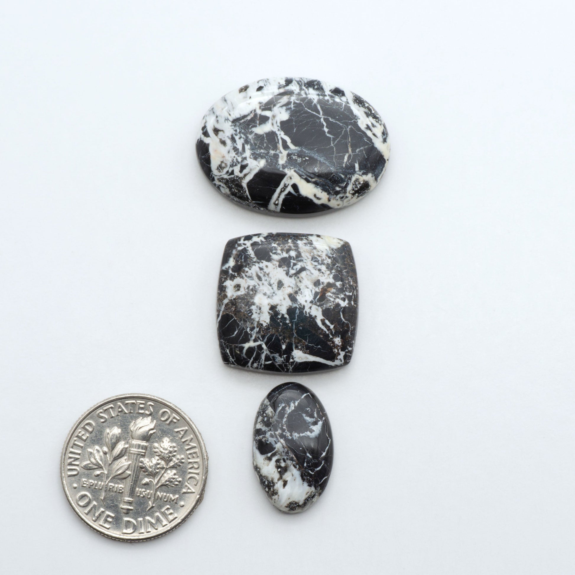 Natural White Buffalo Stone Cabochons are semi-precious gemstones cut into shapes ideal for jewelry-making, making them an excellent choice for artisans.