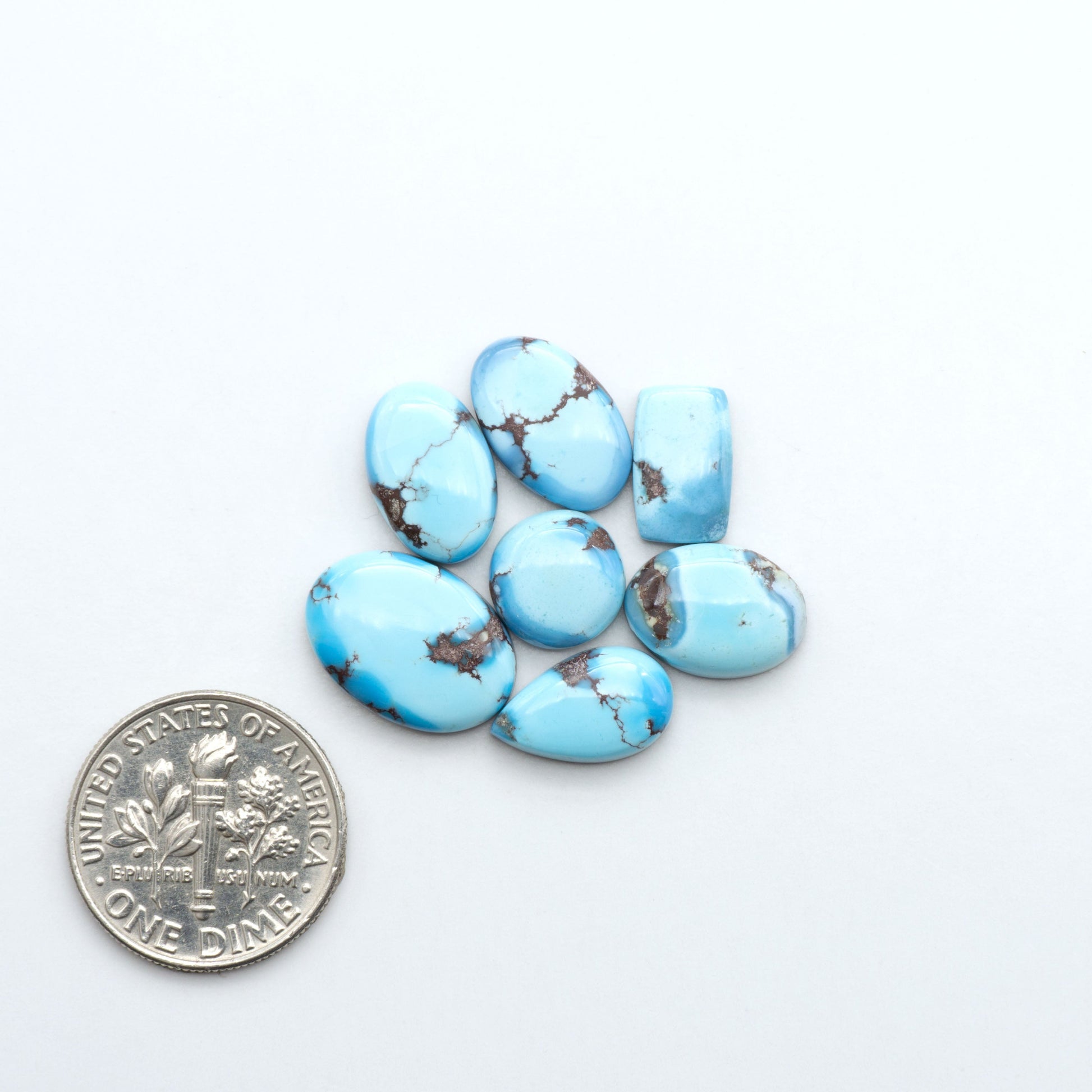 Discover the beauty of Natural Golden Hills Turquoise—prized for its icy blue tones, golden matrix, and exceptional quality. Ideal for artisan jewelry designs.