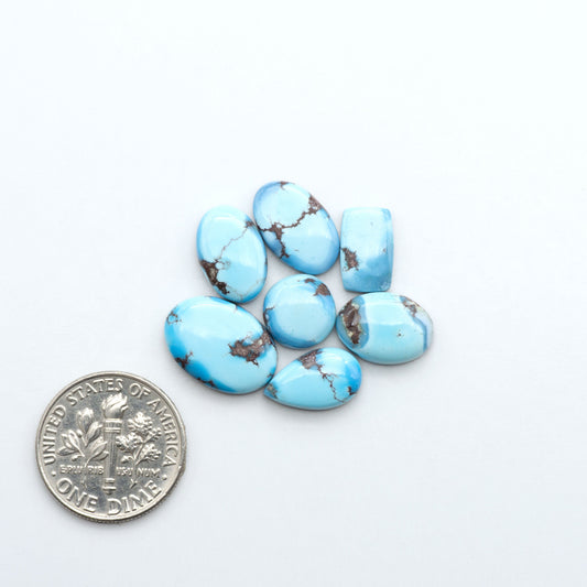 Discover the beauty of Natural Golden Hills Turquoise—prized for its icy blue tones, golden matrix, and exceptional quality. Ideal for artisan jewelry designs.