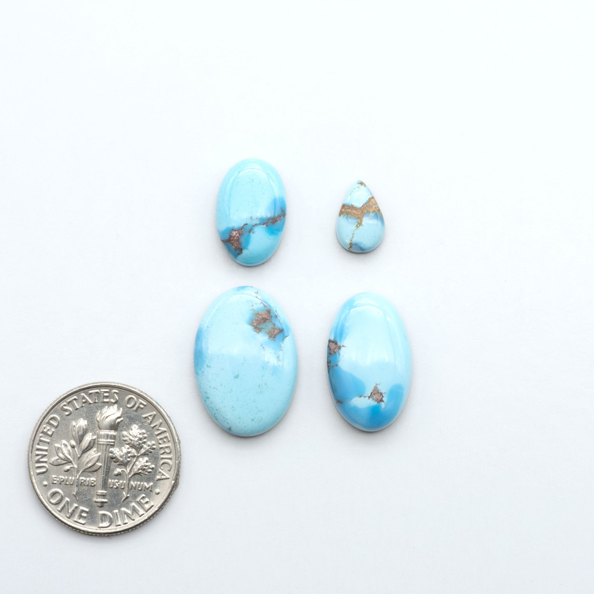 Discover the beauty of Natural Golden Hills Turquoise—prized for its icy blue tones, golden matrix, and exceptional quality. Ideal for artisan jewelry designs.