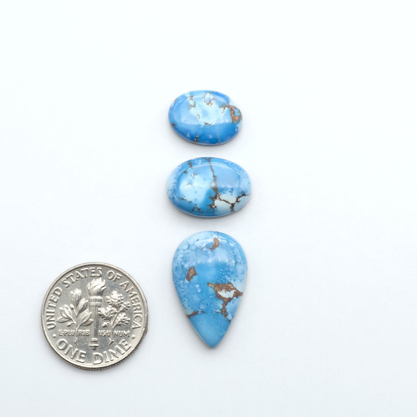 Discover the beauty of Natural Golden Hills Turquoise—prized for its icy blue tones, golden matrix, and exceptional quality. Ideal for artisan jewelry designs.