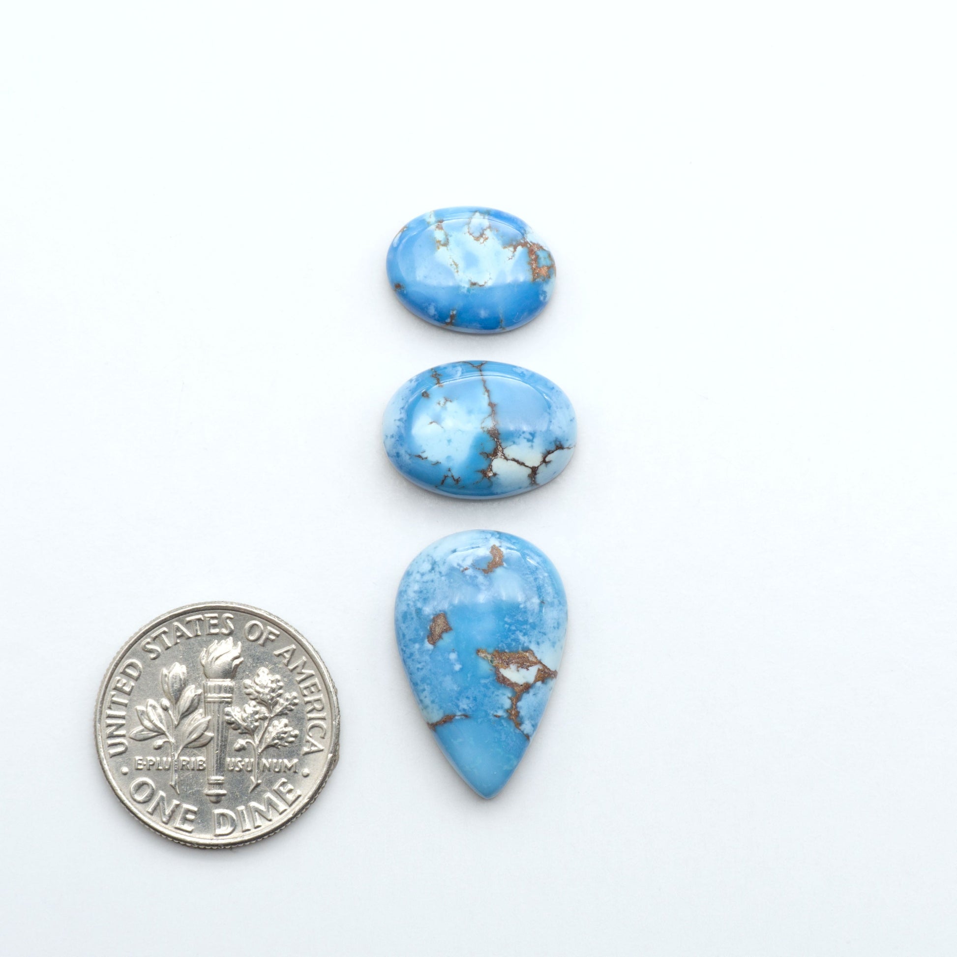 Discover the beauty of Natural Golden Hills Turquoise—prized for its icy blue tones, golden matrix, and exceptional quality. Ideal for artisan jewelry designs.