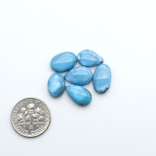 Discover the beauty of Natural Golden Hills Turquoise—prized for its icy blue tones, golden matrix, and exceptional quality. Ideal for artisan jewelry designs.