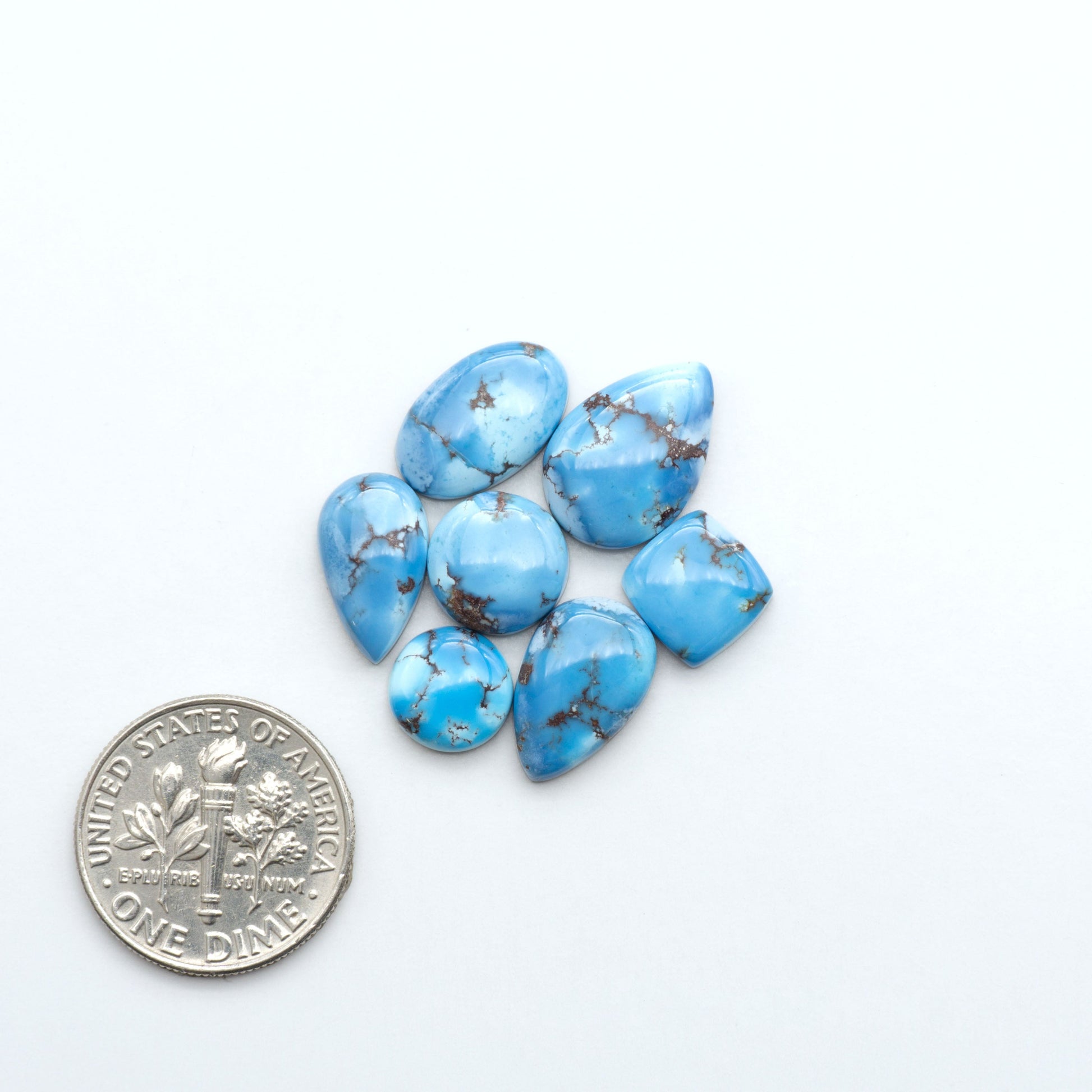 Discover the beauty of Natural Golden Hills Turquoise—prized for its icy blue tones, golden matrix, and exceptional quality. Ideal for artisan jewelry designs.