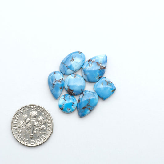 Discover the beauty of Natural Golden Hills Turquoise—prized for its icy blue tones, golden matrix, and exceptional quality. Ideal for artisan jewelry designs.