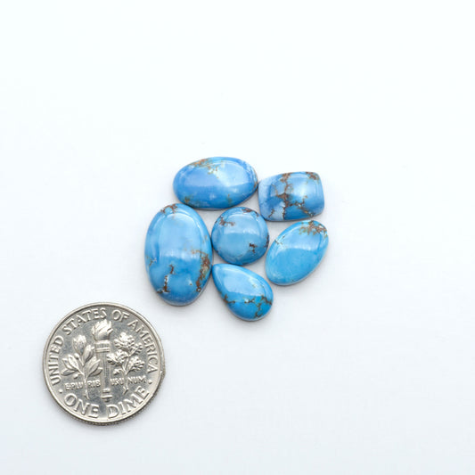Discover the beauty of Natural Golden Hills Turquoise—prized for its icy blue tones, golden matrix, and exceptional quality. Ideal for artisan jewelry designs.