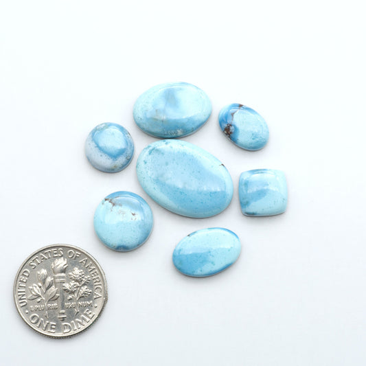Discover the beauty of Natural Golden Hills Turquoise—prized for its icy blue tones, golden matrix, and exceptional quality. Ideal for artisan jewelry designs.