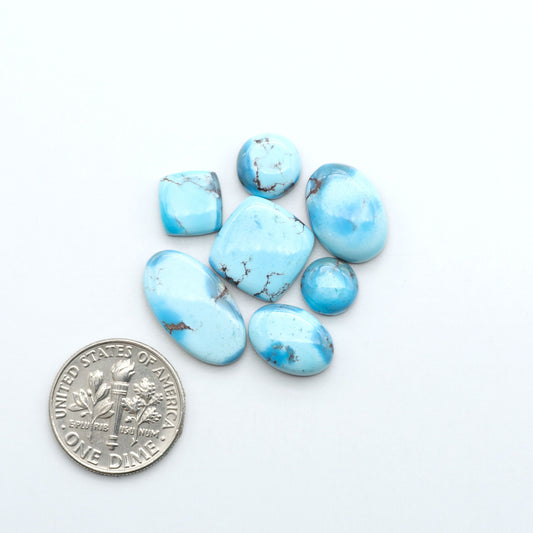 Discover the beauty of Natural Golden Hills Turquoise—prized for its icy blue tones, golden matrix, and exceptional quality. Ideal for artisan jewelry designs.