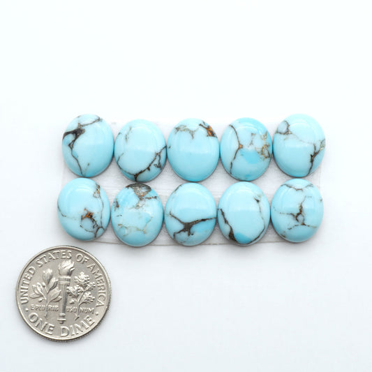 Enhance your jewelry designs with Pressed Turquoise Nugget Cabochons. Crafted from composite materials they add a captivating touch to your creations.