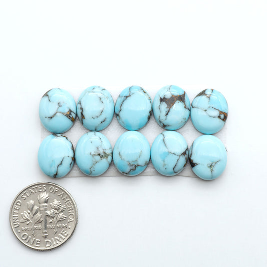 Enhance your jewelry designs with Pressed Turquoise Nugget Cabochons. Crafted from composite materials they add a captivating touch to your creations.