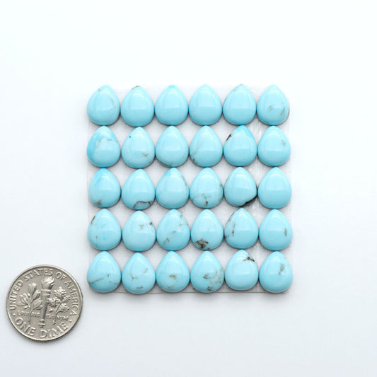 Enhance your jewelry designs with Pressed Turquoise Nugget Cabochons. Crafted from composite materials they add a captivating touch to your creations.