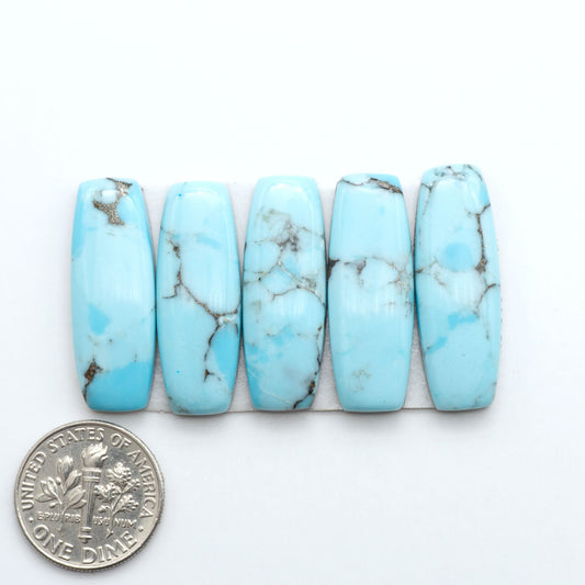 Enhance your jewelry designs with Pressed Turquoise Nugget Cabochons. Crafted from composite materials they add a captivating touch to your creations.