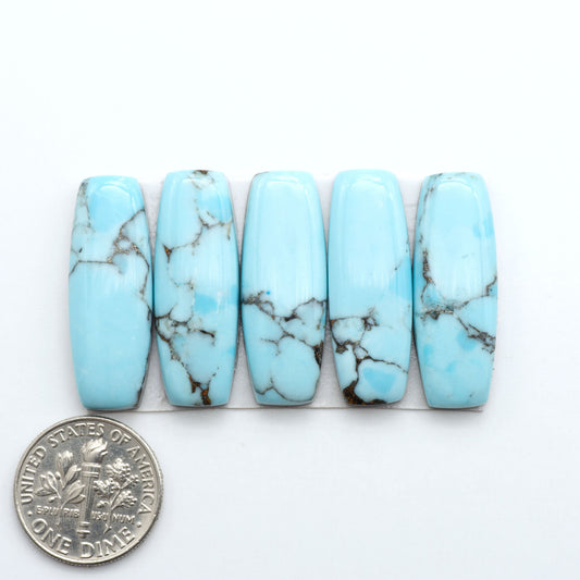 Enhance your jewelry designs with Pressed Turquoise Nugget Cabochons. Crafted from composite materials they add a captivating touch to your creations.