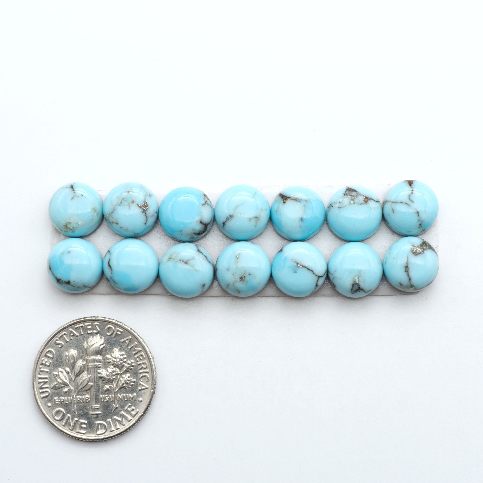Enhance your jewelry designs with Pressed Turquoise Nugget Cabochons. Crafted from composite materials they add a captivating touch to your creations.
