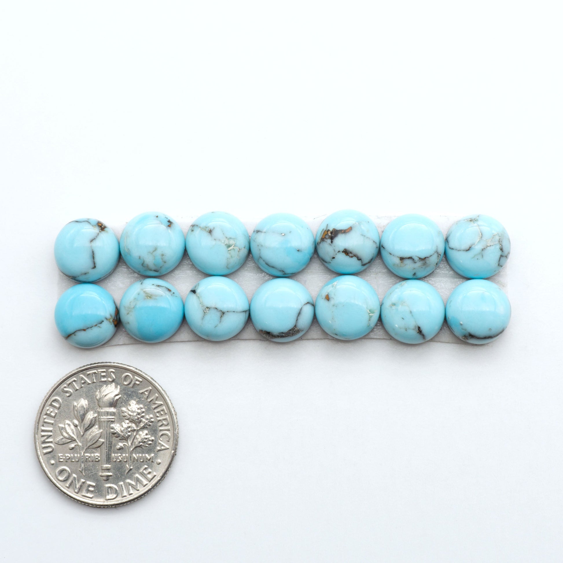 Enhance your jewelry designs with Pressed Turquoise Nugget Cabochons. Crafted from composite materials they add a captivating touch to your creations.