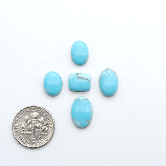 Enhance your jewelry designs with Pressed Turquoise Nugget Cabochons. Crafted from composite materials they add a captivating touch to your creations.