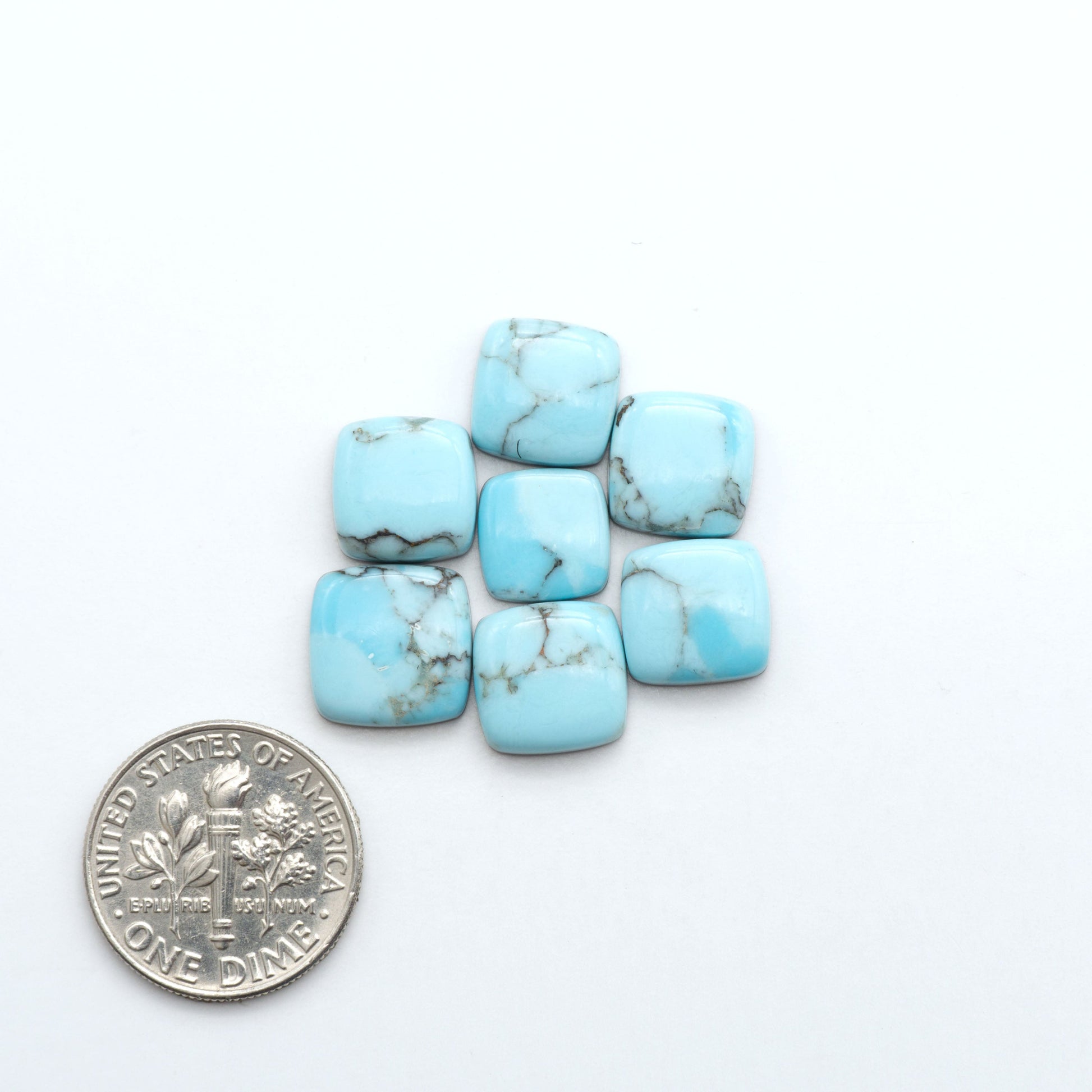 Enhance your jewelry designs with Pressed Turquoise Nugget Cabochons. Crafted from composite materials they add a captivating touch to your creations.