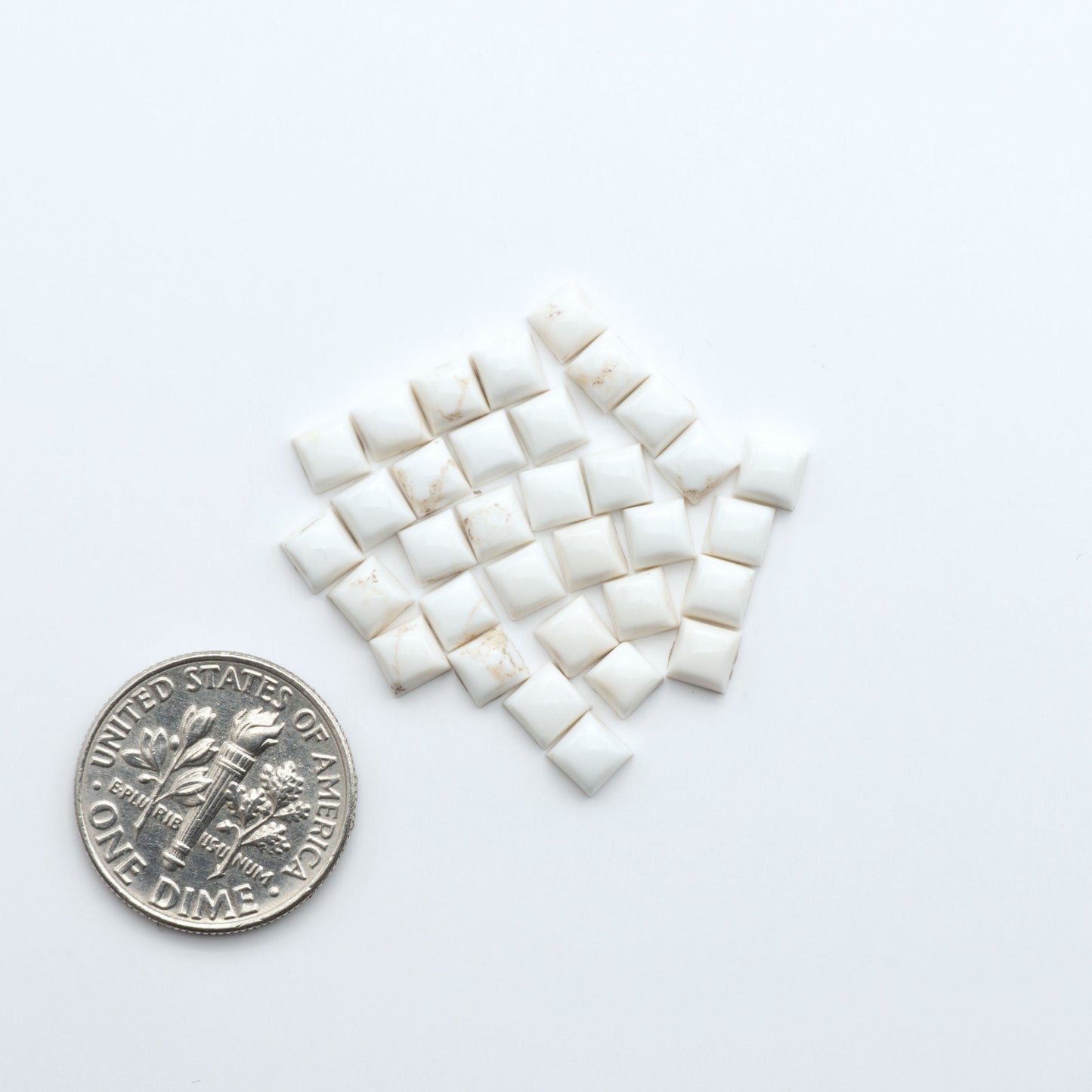Magnesite Cabochons are a must-have for jewelry makers. These stones feature a unique blend of white and brown, making them perfect for a variety of designs.