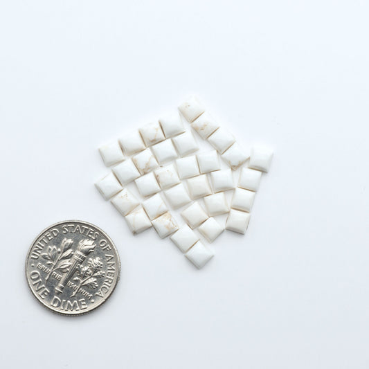 Magnesite Cabochons are a must-have for jewelry makers. These stones feature a unique blend of white and brown, making them perfect for a variety of designs.