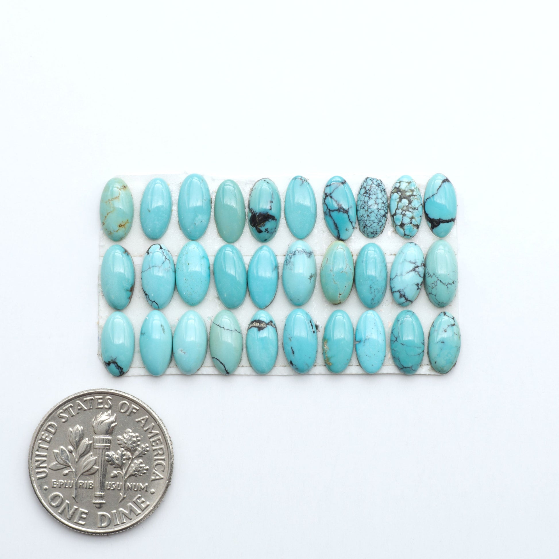 Hubei Cloud Mtn Turquoise is a highly sought-after gemstone known for its color and unique matrix patterns. Add a touch of elegance to your jewelry collection.