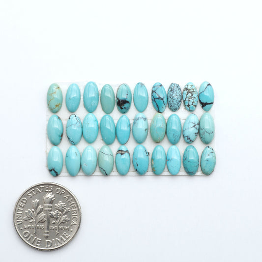 Hubei Cloud Mtn Turquoise is a highly sought-after gemstone known for its color and unique matrix patterns. Add a touch of elegance to your jewelry collection.