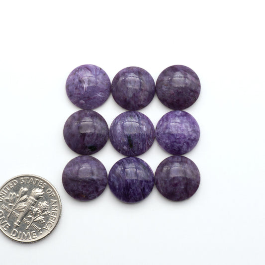 Shop natural Charoite cabochons with vivid violet swirls, perfect for jewelry makers and silversmiths creating rings, pendants, and custom designs.