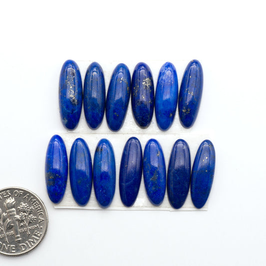 Shop natural Lapis Lazuli cabochons with rich blue tones and golden pyrite, perfect for silversmiths and jewelry makers designing custom pieces.